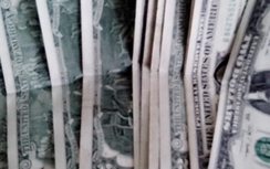 Tàng trữ đô la giả để “đốt phong long” xả xui
