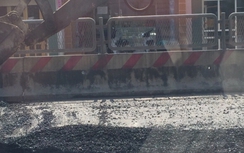 Rải bê tông nhựa QL1 bằng máy xúc: Bộ GTVT yêu cầu chấn chỉnh