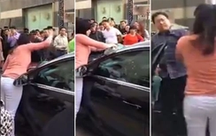 Vợ nổi máu ghen đập nát cửa kính ô tô chồng