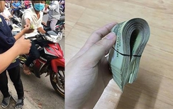 Cha con nhặt từng tờ tiền rơi trả lại lính biên phòng được khen