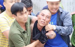 Khởi tố tội giết người kẻ đưa con lên nóc nhà ném xuống đất