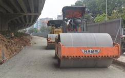 Ảnh: Hà Nội đồng loạt xén vỉa hè, dải phân cách nhiều tuyến đường