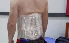 Người đàn ông dùng băng dính cuốn 58 chiếc đồng hồ quanh người bị bắt