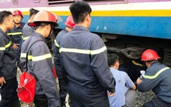 Người đàn ông thoát chết kỳ diệu dưới gầm tàu hỏa