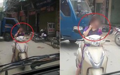 Video: Người phụ nữ "hiên ngang" chặn cả đoàn xe để buôn điện thoại