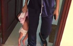 Danh tính người mẹ trẻ xăm trổ xách lủng lẳng con mới 18 ngày tuổi