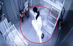 Phẫn nộ nữ giúp việc dốc ngược hai chân bé gái 13 tháng tuổi để "ru ngủ"