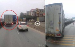 Video: Xe tải bị xe container ép bay lên dải phân cách