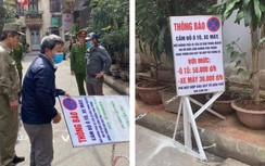 Một hộ dân tự ý lập barie chặn xe thu tiền giữa Thủ đô