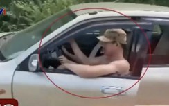 CSGT Quảng Bình xử phạt 2 vợ chồng ngồi chung ghế lái điều khiển ôtô mở cửa