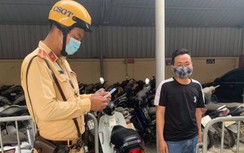 Bị CSGT kiểm tra, lái xe trình bằng lái giả mua với giá 700 nghìn đồng