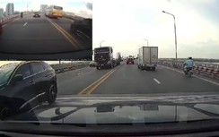 Phớt lờ biển cấm, người đi mô tô vô tư lên cầu Thăng Long