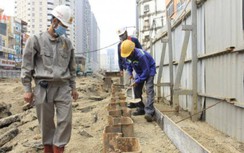 Chùm ảnh: Công nhân hối hả thi công hầm chui Lê Văn Lương gần 700 tỉ đồng