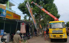 Giải tỏa, tháo dỡ công trình vi phạm hành lang ATGT trên quốc lộ 26