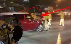 Bị kiểm tra nồng độ cồn, tài xế ô tô hất CSGT lên nắp capo bỏ chạy
