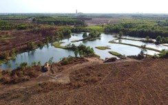 Cận cảnh những hồ nước khổng lồ dập bụi ở sân bay Long Thành