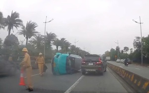 Tai nạn giao thông 22/5: Tài xế buồn ngủ tông dải phân cách, taxi lật nghiêng giữa đường
