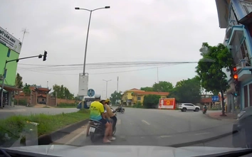 Bắc Ninh: Xử phạt người phụ nữ đèo 2 con nhỏ đi vòng vèo "né" camera AI để vượt đèn đỏ