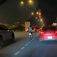 Xe máy lao vào dải phân cách ngã ra đường bị ô tô chèn qua