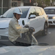 Bất ngờ băng ngang từ góc khuất, người đi xe máy bị ô tô húc ngã