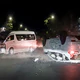 Ô tô 7 chỗ lật ngửa giữa giao lộ sau cú tông ngang